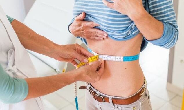 redução da cintura da menina em uma semana